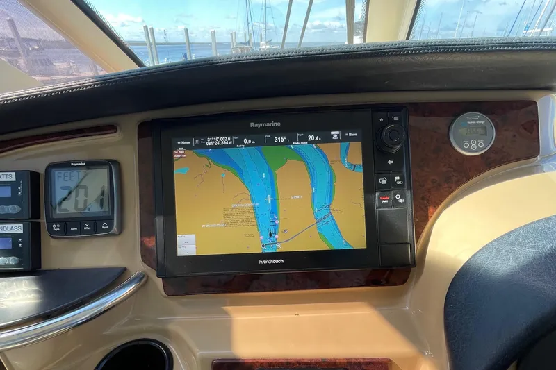 Slide: The Image of Carver 506 Motor Yacht 2001 helm with navigation system and gauges. - 11