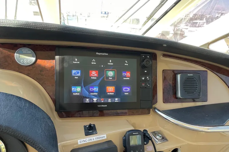 Slide: The Image of Helm station of a 2001 Carver 506 Motor Yacht with Raymarine navigation system. - 12