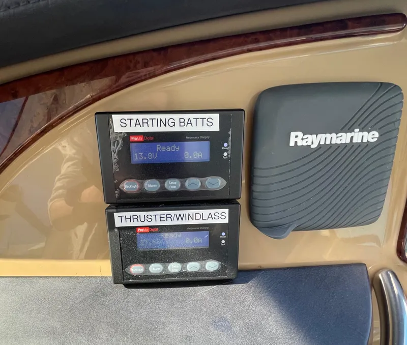 Slide: The Image of Control panel of a 2001 Carver 506 Motor Yacht with Raymarine equipment. - 14