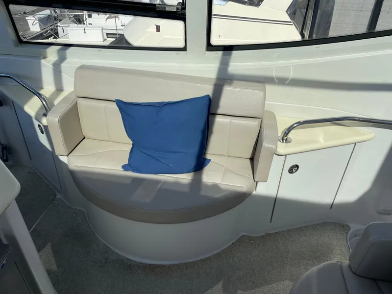 Slide: The Image of Interior seating area of 2001 Carver 506 Motor Yacht with blue cushion. - 22