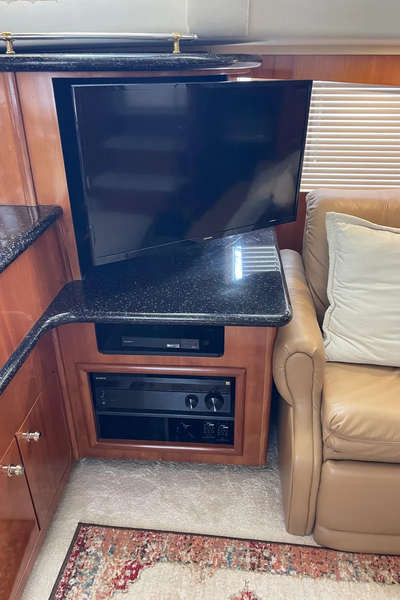 Slide: The Image of Entertainment center in 2001 Carver 506 Motor Yacht with TV and audio system. - 27