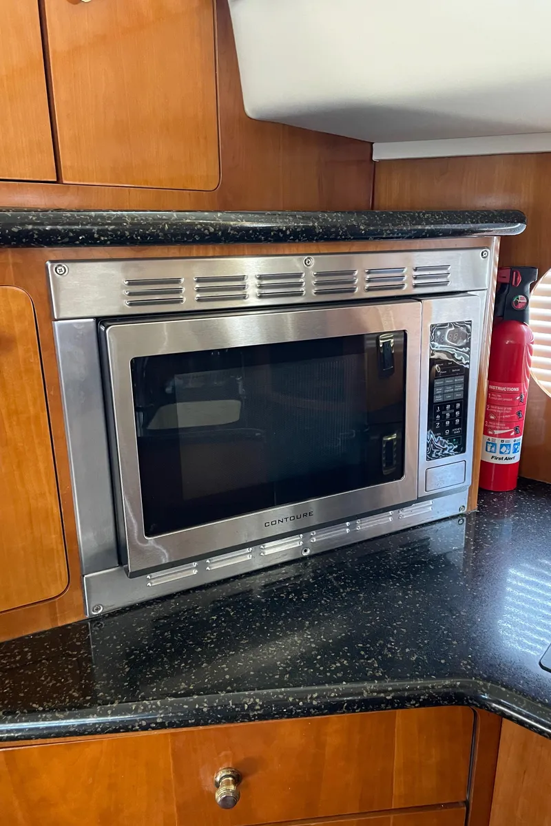 Slide: The Image of Built-in microwave in the kitchen of a 2001 Carver 506 Motor Yacht. - 34