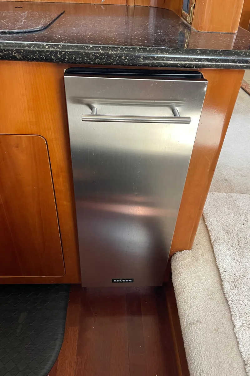 Slide: The Image of Stainless steel appliance in the kitchen of a 2001 Carver 506 Motor Yacht. - 35