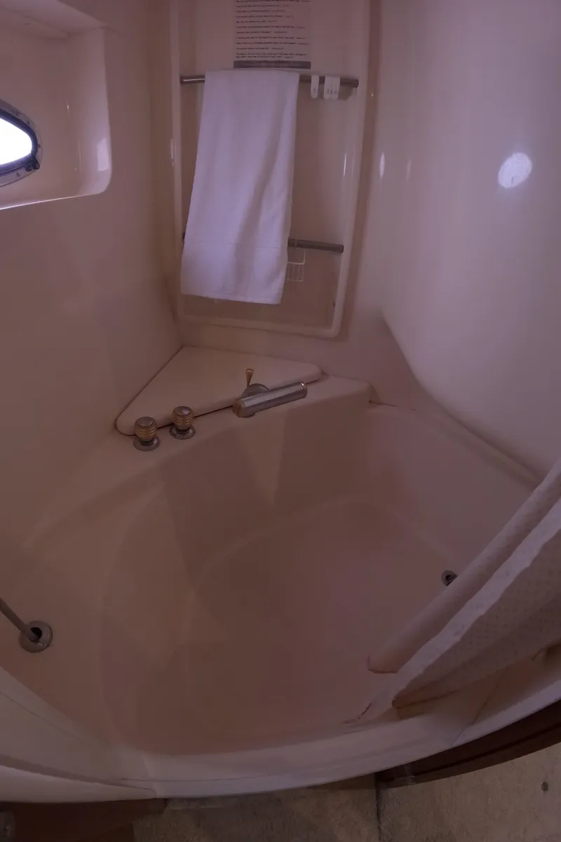 Slide: The Image of 2001 Carver 506 Motor Yacht bathroom with shower and towel rack. - 46