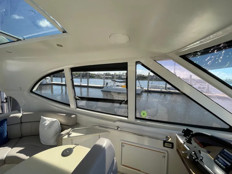 Slide: The Image of Interior view of 2001 Carver 506 Motor Yacht with marina in the background. - 7