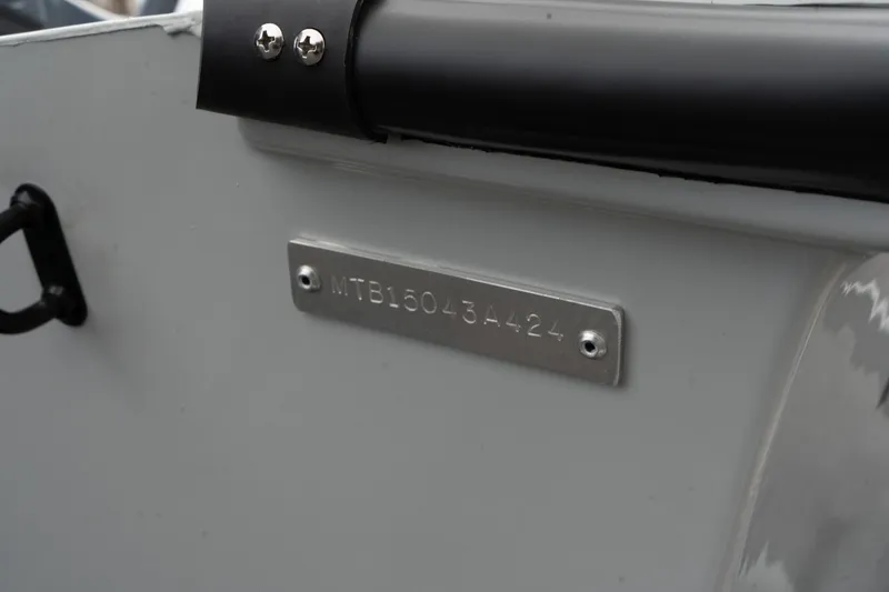 Slide: The Image of Metallic identification plate on Mi Tide V1503, 2024 model. - 10