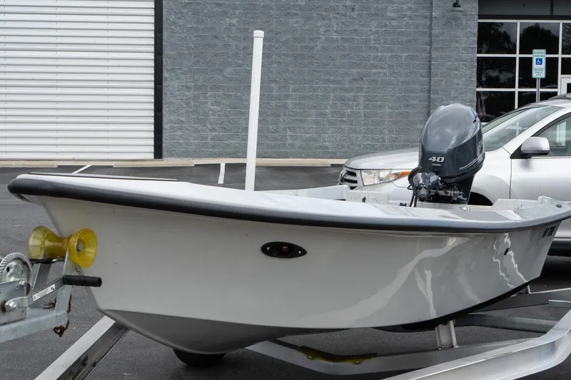 Slide: The Image of 2024 Mi Tide V1503 boat on trailer in parking lot. - 4