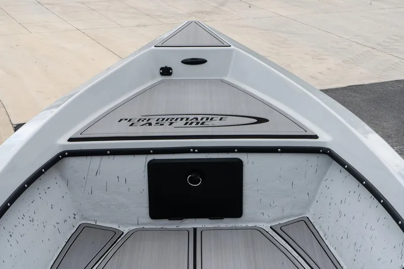 Slide: The Image of Mi Tide V1503 2024 boat interior with sleek gray design and storage compartment. - 7