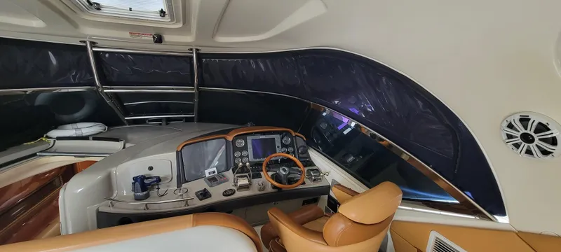Slide: The Image of Interior helm of 2004 Sea Ray 455 Sundancer yacht with modern navigation equipment. - 15