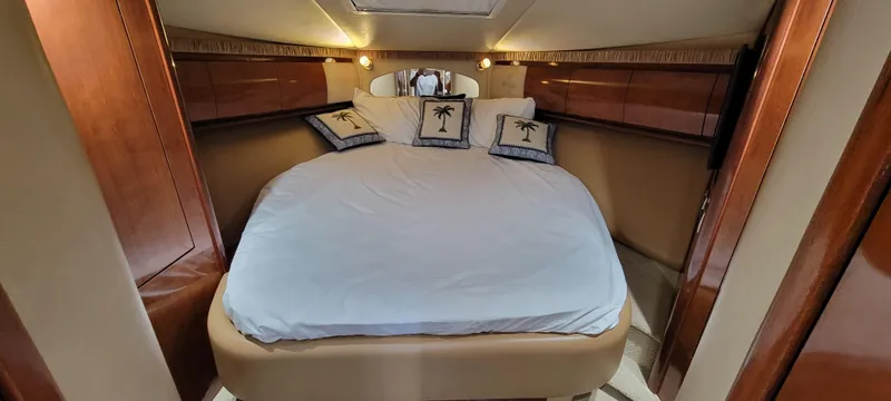 Slide: The Image of Luxurious bedroom in 2004 Sea Ray 455 Sundancer yacht with cozy bedding. - 20