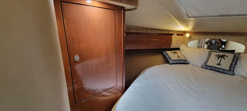 Slide: The Image of Luxurious bedroom interior of 2004 Sea Ray 455 Sundancer yacht. - 21
