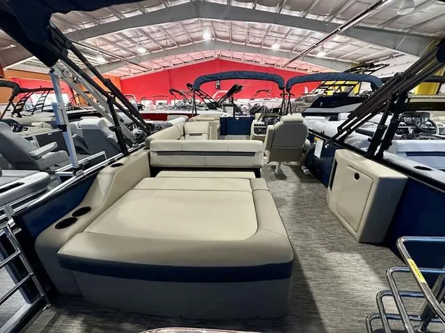 Slide: The Image of 2024 Godfrey Sweetwater 2286 SFL GTP pontoon boat interior with spacious seating. - 10