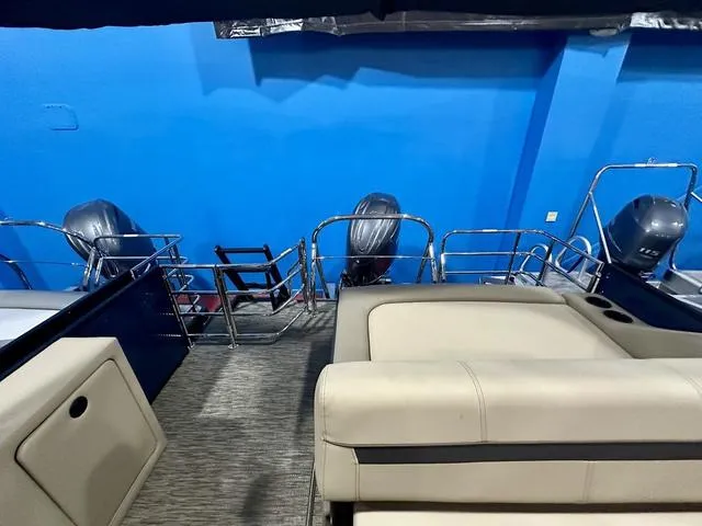 Slide: The Image of 2024 Godfrey Pontoons Sweetwater 2286 SFL GTP 27 In. Center Tube Package interior with seating and outboard motors - 12