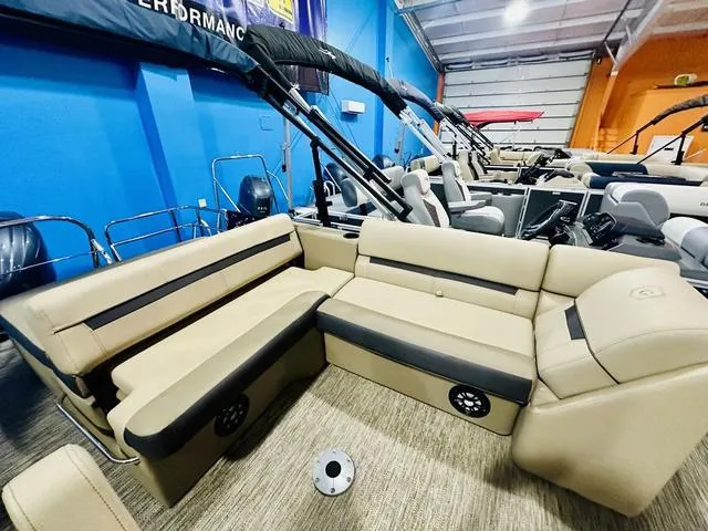 Slide: The Image of 2024 Godfrey Pontoons Sweetwater 2286 SFL GTP 27 In. Center Tube Package, beige seating, showroom. - 5