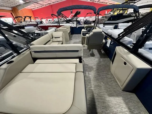Slide: The Image of 2024 Godfrey Sweetwater 2286 SFL GTP pontoon boat interior with beige seating. - 9