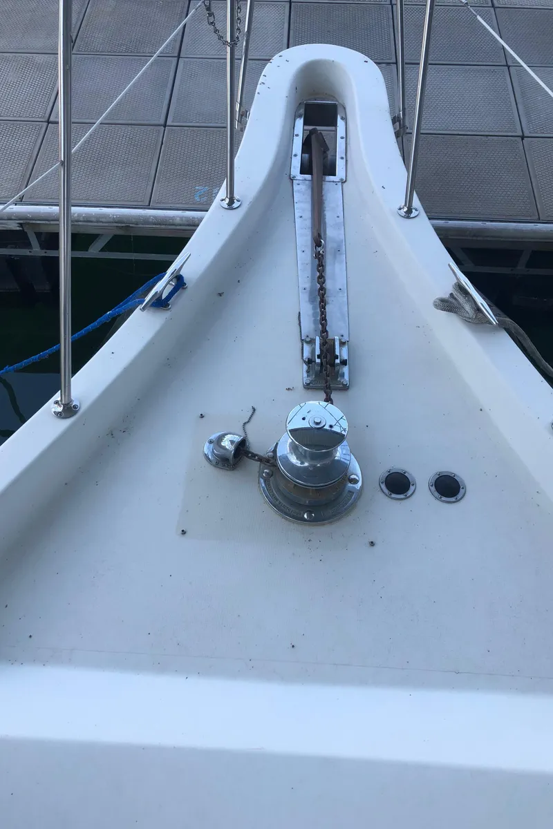 Slide: The Image of Bow of 1989 Bluewater Yachts 55' Coastal Cruiser with anchor winch. - 25