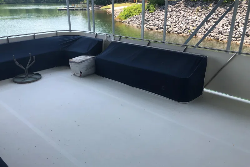 Slide: The Image of Spacious deck of 1989 Bluewater Yachts 55' Coastal Cruiser with covered seating. - 29