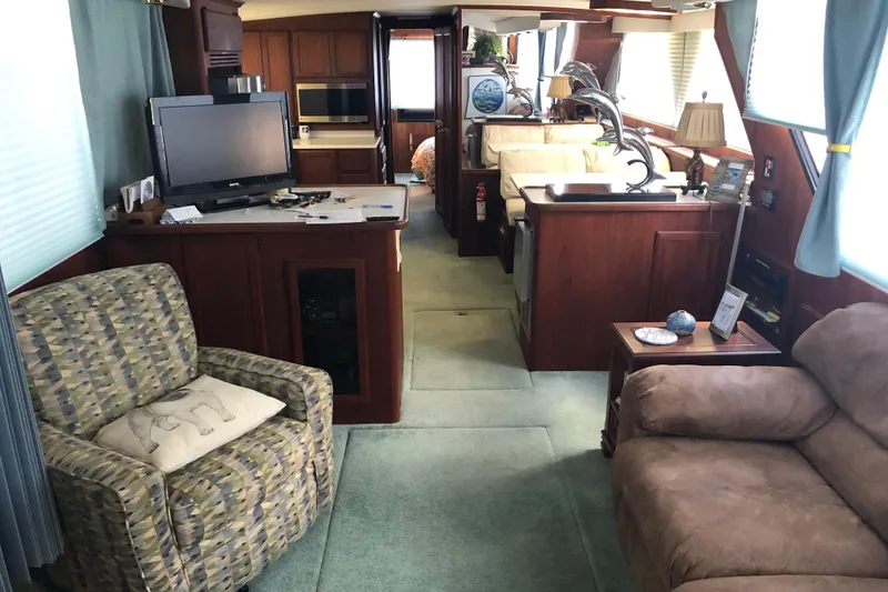 Slide: The Image of Interior of 1989 Bluewater Yachts 55' Coastal Cruiser with cozy living area and modern amenities. - 39