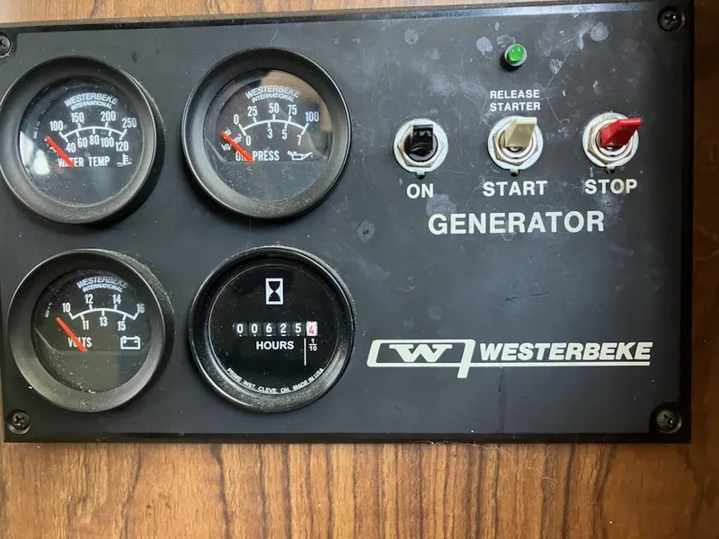 Slide: The Image of Westerbeke generator control panel on a 1989 Bluewater Yachts 55' Coastal Cruiser. - 6