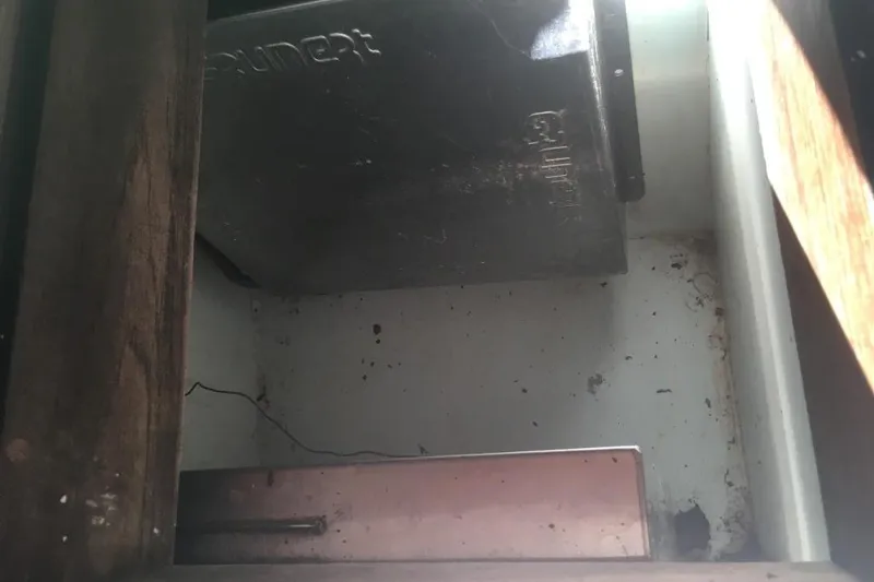 Slide: The Image of Interior view of a 1973 Hodgdon DOLPHIN 47 boat compartment. - 24