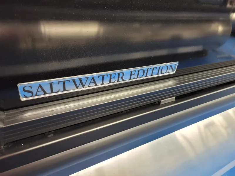 Slide: The Image of Saltwater Edition badge on 2024 Harris Cruiser 250 boat. - 29