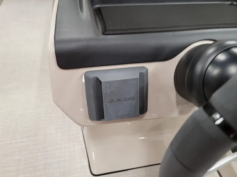 Slide: The Image of 2024 Harris Cruiser 210 boat dashboard with JL Audio speaker. - 15