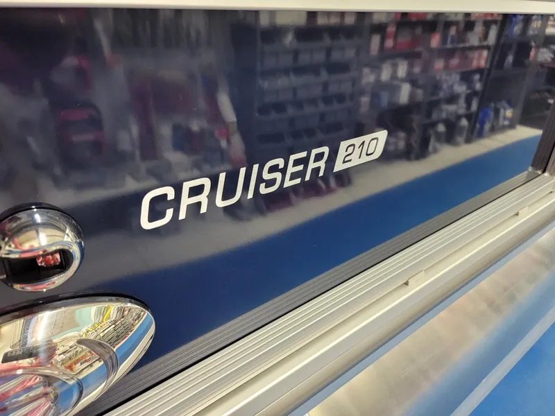 Slide: The Image of 2024 Harris Cruiser 210 boat model nameplate. - 30