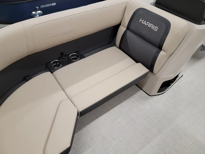 Slide: The Image of 2024 Harris Cruiser 210 boat interior seating with cup holders. - 8