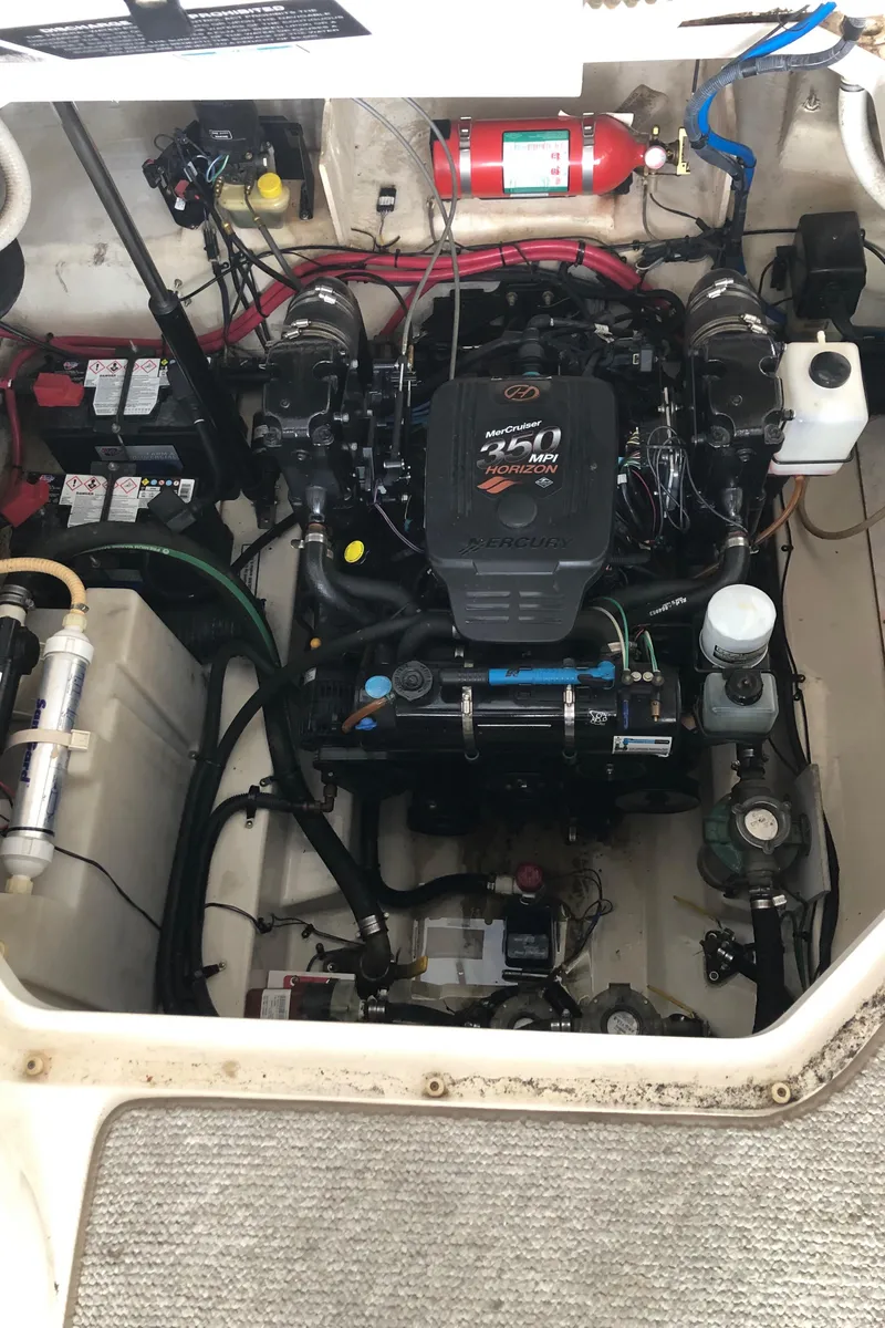 Slide: The Image of Engine compartment of a 2007 Sea Ray 260 Sundancer boat. - 11