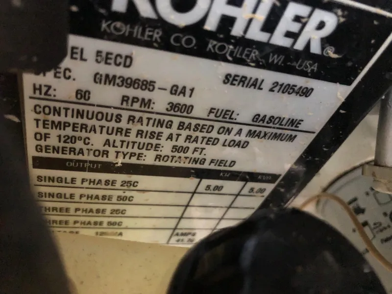 Slide: The Image of Kohler generator label on a 2007 Sea Ray 260 Sundancer boat. - 15