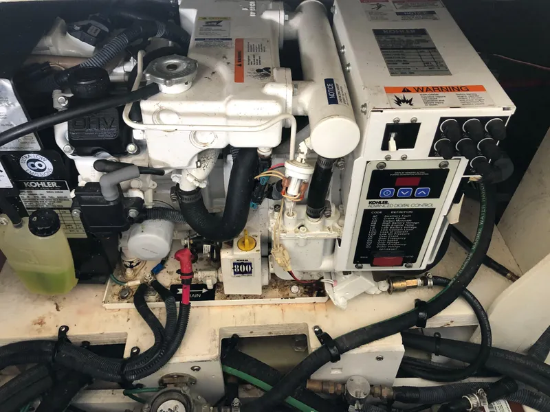 Slide: The Image of Engine compartment of a 2007 Sea Ray 260 Sundancer boat. - 16