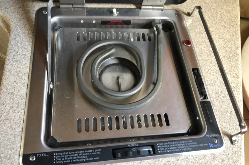 Slide: The Image of Electric stove on a 2007 Sea Ray 260 Sundancer boat. - 21