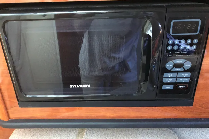 Slide: The Image of Sylvania microwave in 2007 Sea Ray 260 Sundancer boat kitchen. - 22