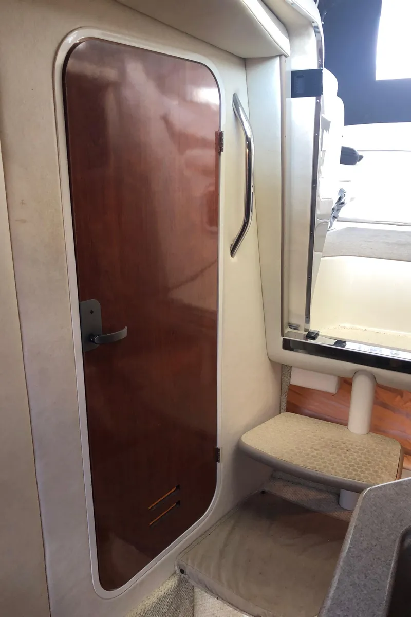 Slide: The Image of Interior cabin door of a 2007 Sea Ray 260 Sundancer boat. - 28