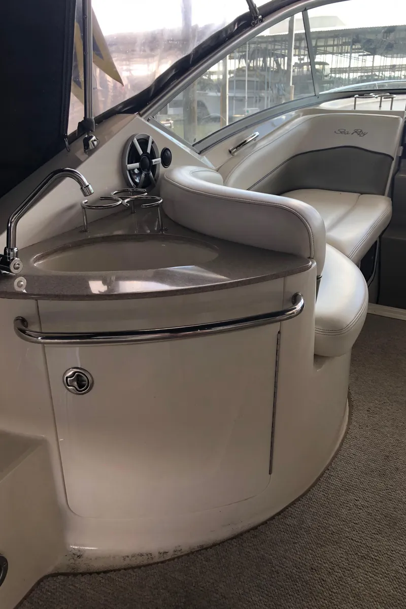 Slide: The Image of 2007 Sea Ray 260 Sundancer interior with sink and seating area. - 35