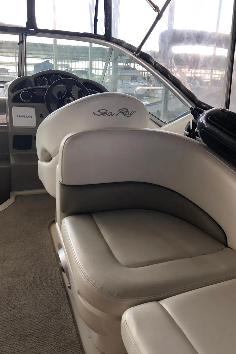 Slide: The Image of 2007 Sea Ray 260 Sundancer boat interior with helm and seating. - 36