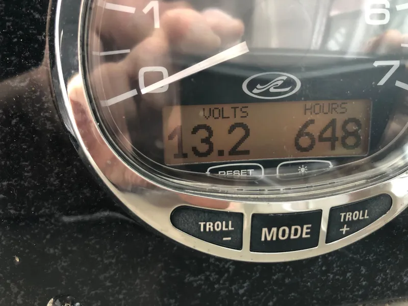 Slide: The Image of Close-up of 2007 Sea Ray 260 Sundancer gauge showing 13.2 volts and 648 hours. - 8