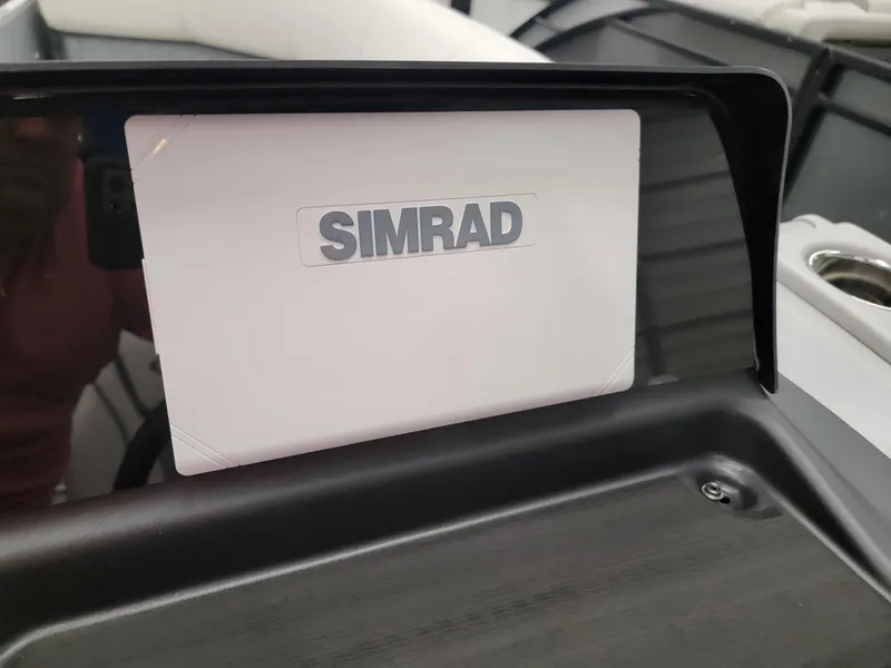Slide: The Image of Simrad display on 2024 Harris Sunliner 210 boat dashboard. - 10