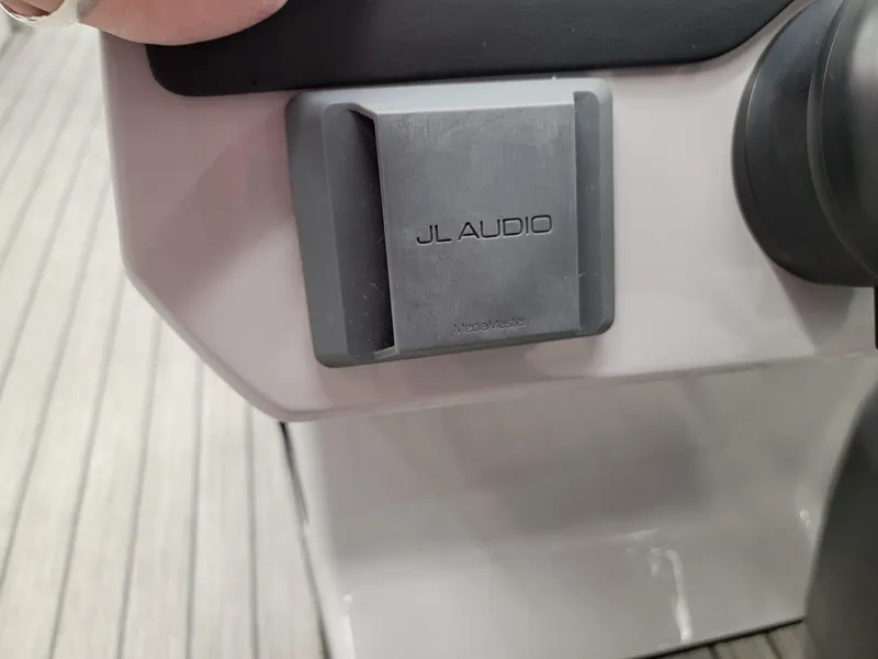 Slide: The Image of JL Audio system on 2024 Harris Sunliner 210 boat. - 11