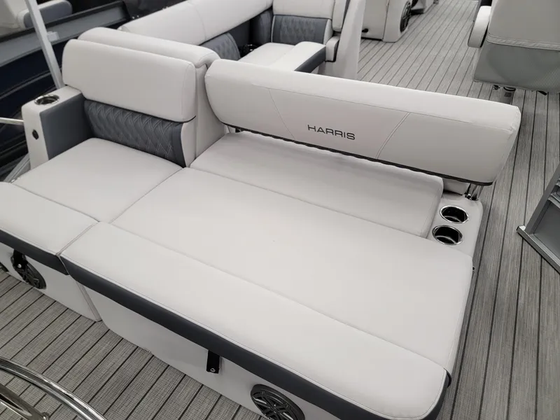 Slide: The Image of 2024 Harris Sunliner 210 boat interior with luxurious seating. - 18