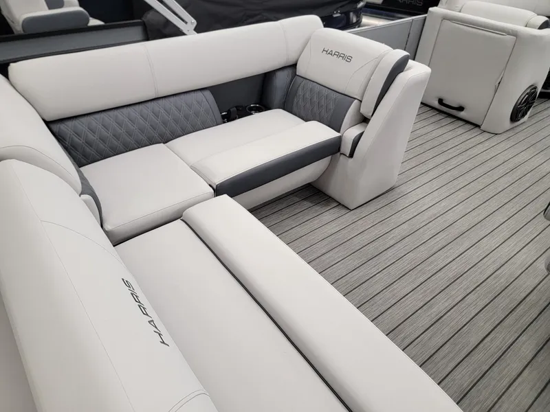 Slide: The Image of 2024 Harris Sunliner 210 boat interior with luxurious seating and modern design. - 20
