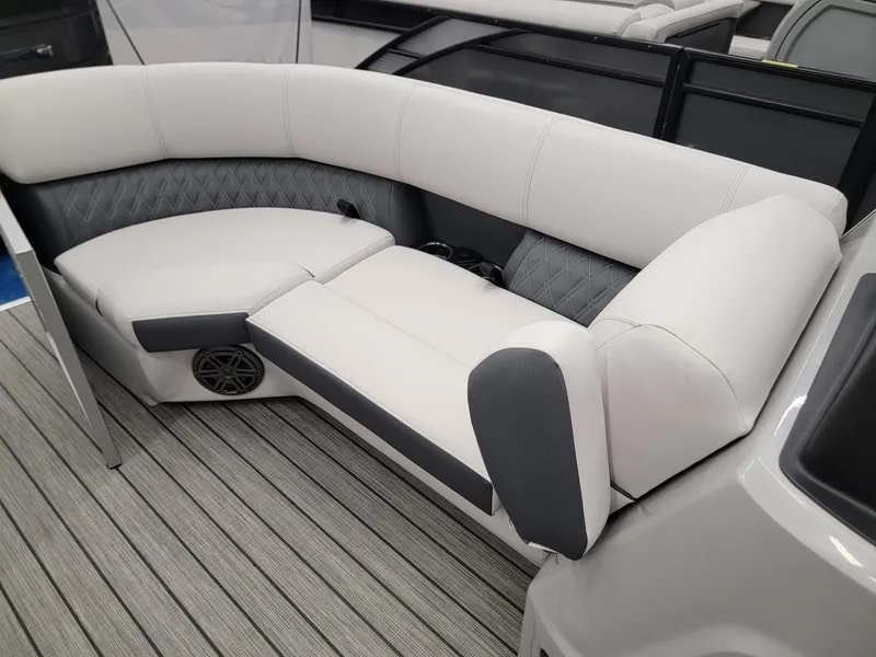 Slide: The Image of 2024 Harris Sunliner 210 boat interior with luxurious seating and modern design. - 26