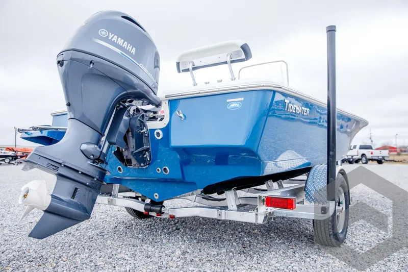 Slide: The Image of 2024 Tidewater 1910 Bay Max boat with Yamaha outboard motor on trailer. - 12