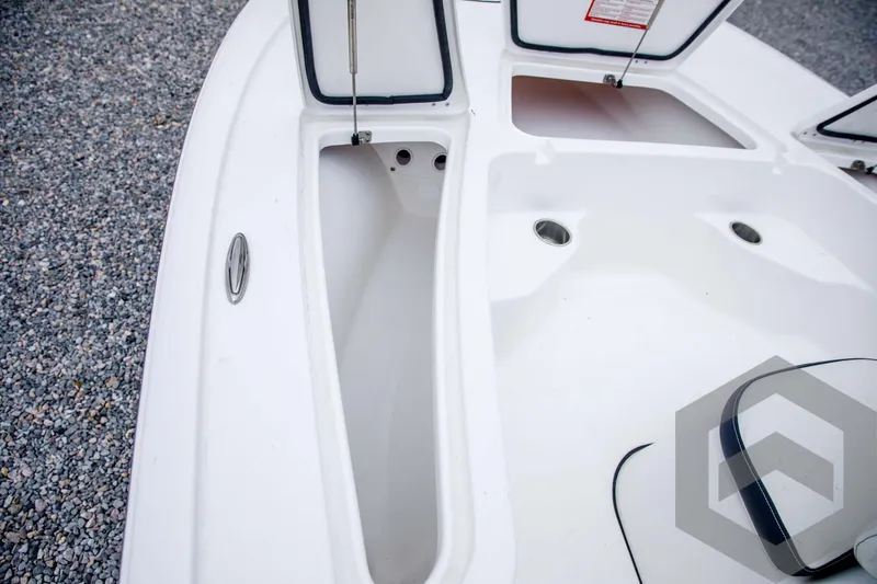 Slide: The Image of 2024 Tidewater 1910 Bay Max boat storage compartments and deck. - 21