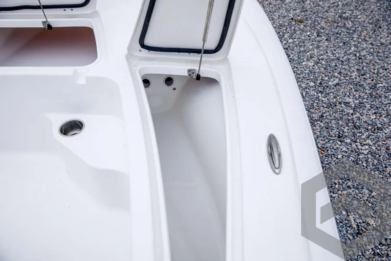 Slide: The Image of 2024 Tidewater 1910 Bay Max boat storage compartments and deck details. - 23
