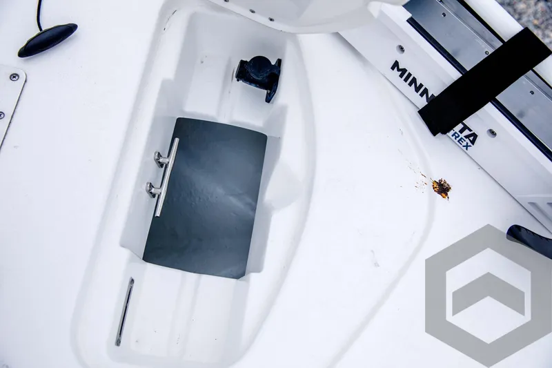 Slide: The Image of 2024 Tidewater 1910 Bay Max boat interior with Minn Kota trolling motor. - 24