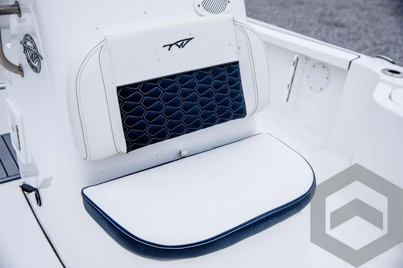 Slide: The Image of 2024 Tidewater 1910 Bay Max boat seat with white and blue upholstery. - 26