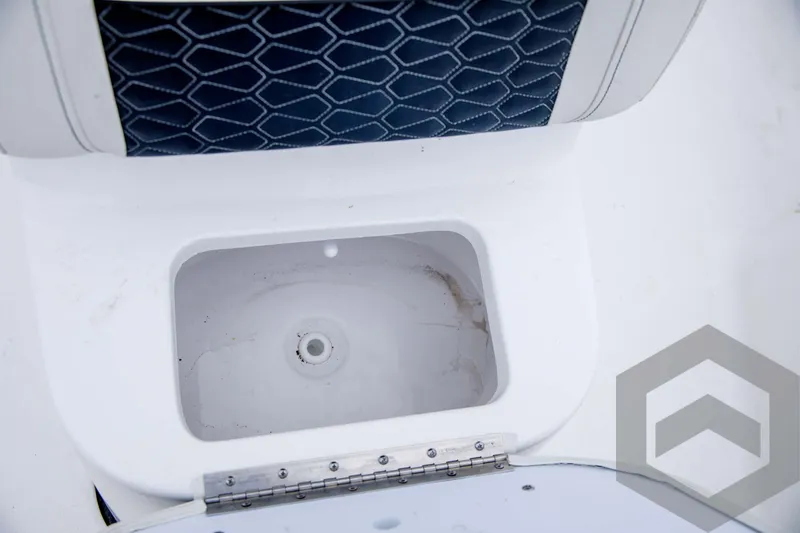 Slide: The Image of 2024 Tidewater 1910 Bay Max boat storage compartment. - 27