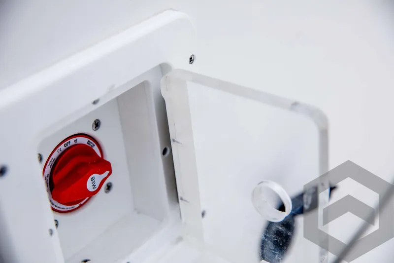 Slide: The Image of Close-up of 2024 Tidewater 1910 Bay Max boat battery switch. - 35