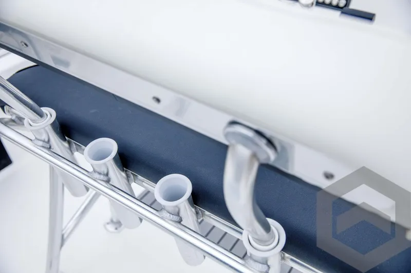 Slide: The Image of Close-up of the 2024 Tidewater 1910 Bay Max boat's rod holders and seating. - 38